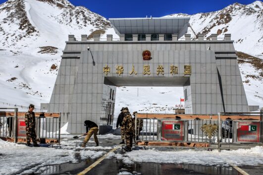 Pak-China border at Khunjerab Pass covered in snow with soldiers on duty.